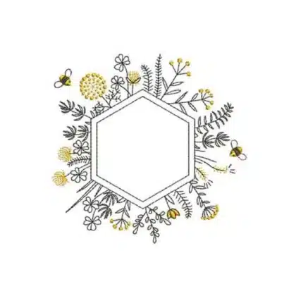 Delicate machine embroidery design of a hexagon frame surrounded by wildflowers and buzzing honeybees, a perfect botanical wreath for monograms.